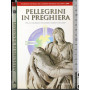 Pellegrini in preghiera.