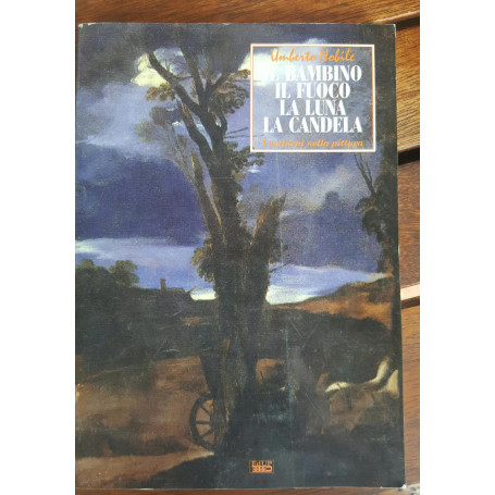 Il bambino il fuoco la luna la candela